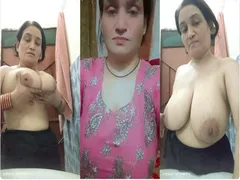 PAKISTANI MILF SQUEEZING HUGE MELONS