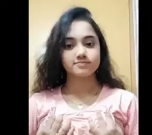 Sexy young girl showing boobs